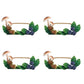 The Juliska Forest Walk Tabletop Collection features four identical frames with mushrooms, blueberries, green leaves, and gold rope accents—ideal as unique place card holders for your next gathering.