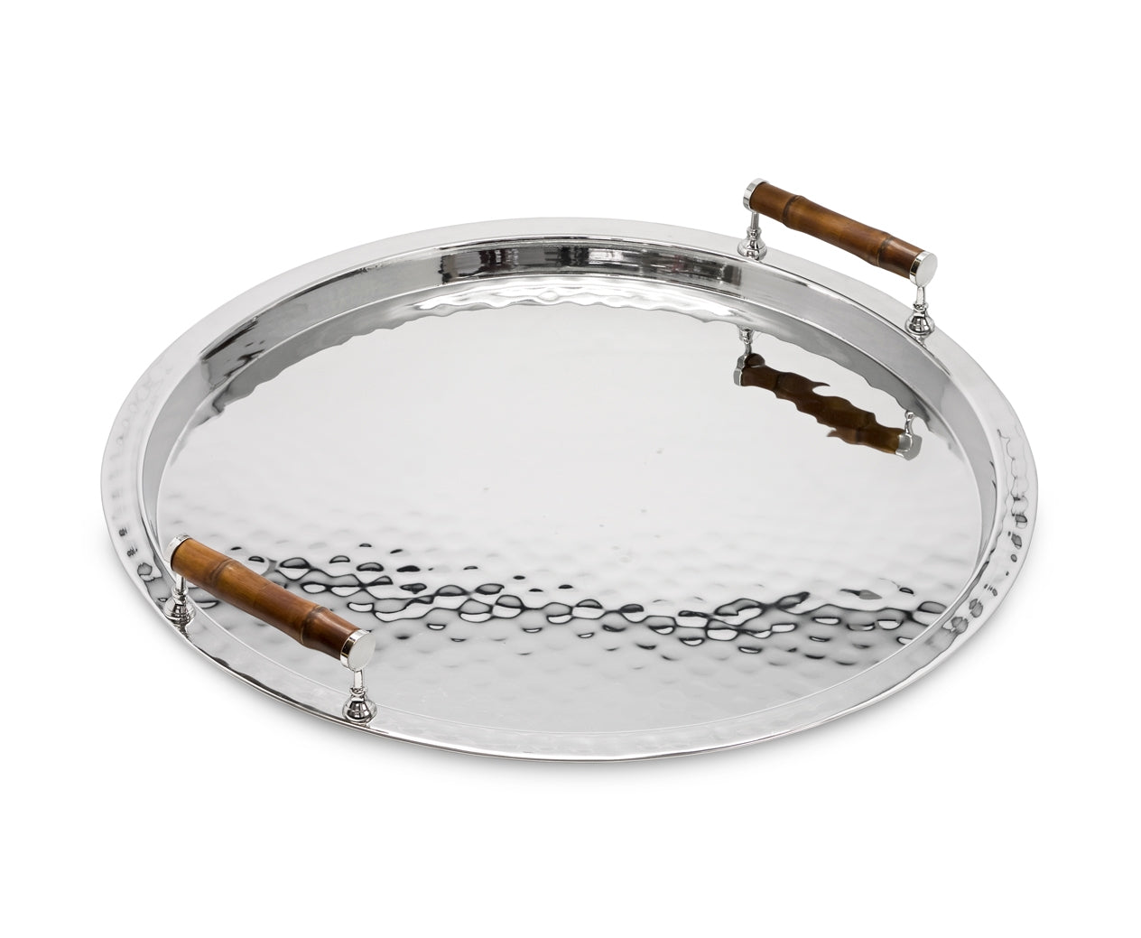 From the ezrad Bamboo and Stainless Steel Decor Collection, this round silver serving tray features hammered stainless steel and two bamboo handles, combining modern elegance with natural accents.