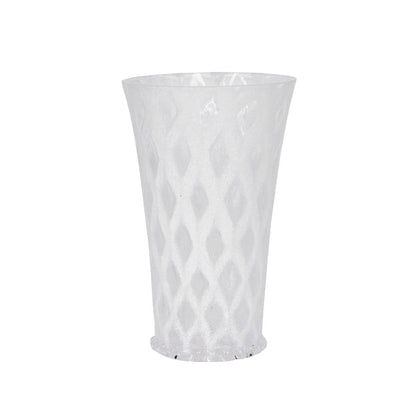 The Juliska Trellis Drinkware Collection features a clear, tall plastic lemonade glass with a textured diamond pattern, blending modern style and classic aesthetics, shown upright on a white background.
