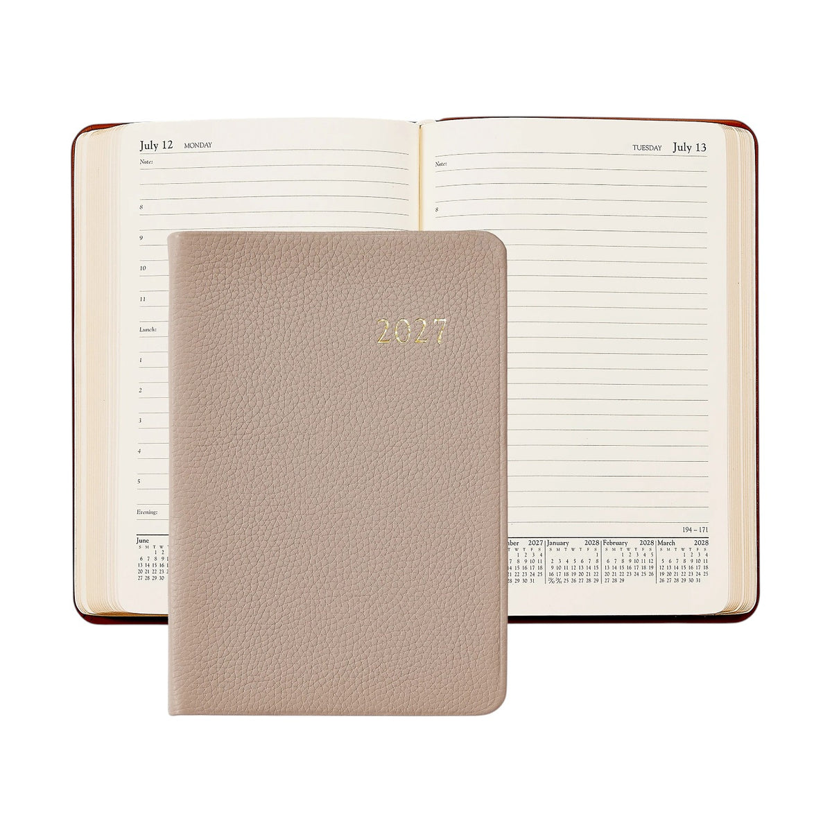 A beige 2027 Daily Journal by Graphic Image with a textured cover is placed on top of an open diary, showing entries for July 12 and July 13.