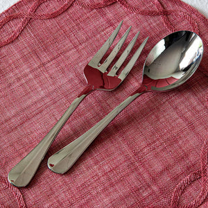 The Juliska Bistro 2 Piece Hostess Serving Set, Polished, is arranged side by side on a pink woven placemat.