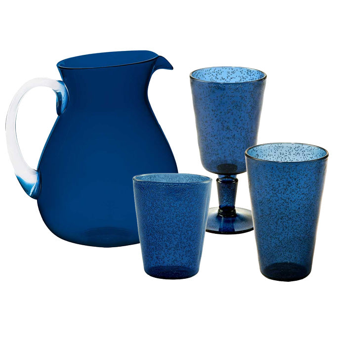 The Memento Deep Blue Acrylic Drinkware Collection features a durable blue acrylic pitcher with a clear handle and three assorted drinking glasses—ideal for outdoor dining.