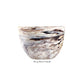The Deep Bowl Small from the Mocha Resin Serveware Collection by Nashi Home features a marbled pattern in cream, brown, and gray. Crafted from food safe Nashi resinware.