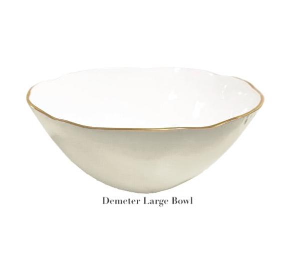 The Demeter Large Bowl from Beatriz Ball’s Encanto Cream Serveware Collection is a durable aluminum alloy bowl with a scalloped rim and thin gold edge, perfect for elegant serving.