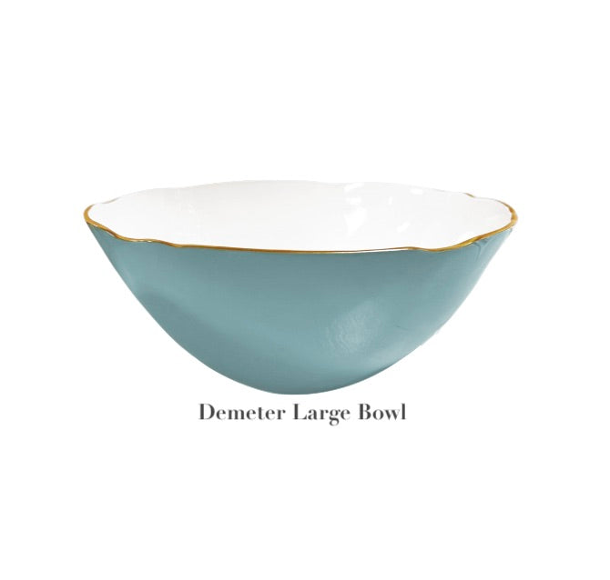 A large bowl from Beatriz Ball's Encanto Turquoise Serveware Collection featuring a teal enameled exterior, white interior, and a slim gold rim. Below it reads "Demeter Large Bowl.