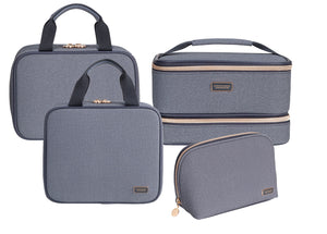 The Stephanie Johnson Denim Travel Collection features four zippered organizer bags in assorted shapes and sizes, ideal for use as makeup bags or cosmetic cases, shown against a white background.