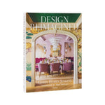 Front cover of the book "Design Reimagined" by Rizzoli, showcasing a stylish dining room with colorful chairs, a chandelier, and scenic-patterned wallpaper that exemplifies fresh approaches to traditional interior design.