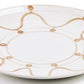 Themis Z Serenity Beige Dinnerware Collection: a white ceramic handcrafted dinner plate with a tan wavy Serenity pattern and circular accents, artfully hand-painted around the rim.