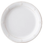 The Berry & Thread Melamine Whitewash Dinnerware Collection by Juliska features a white plate with a raised edge and signature rope-like motif around the rim—perfect for adventurous entertainers.