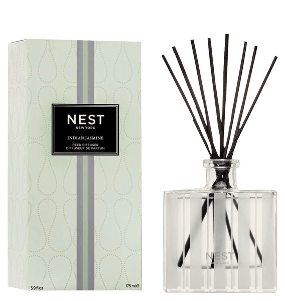 The NEST Indian Jasmine Reed Diffuser by Nest, designed with elegant stripes and droplets, encapsulates the captivating aroma of jasmine fields.