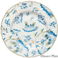 Ginori 1735 Oro Di Doccia Turchese Dinnerware Collection: White porcelain dinner plate featuring blue, yellow floral and Ji Ondori roosters motif with hand-painted gold trim on a scalloped edge; "Dinner Plate" text at lower right.