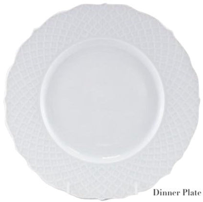 A white porcelain dinner plate from the Empire White Dinnerware Collection by Anna Weatherley, featuring a textured rim, is displayed against a plain background. "Dinner Plate" appears in the lower right corner. Made in Portugal.