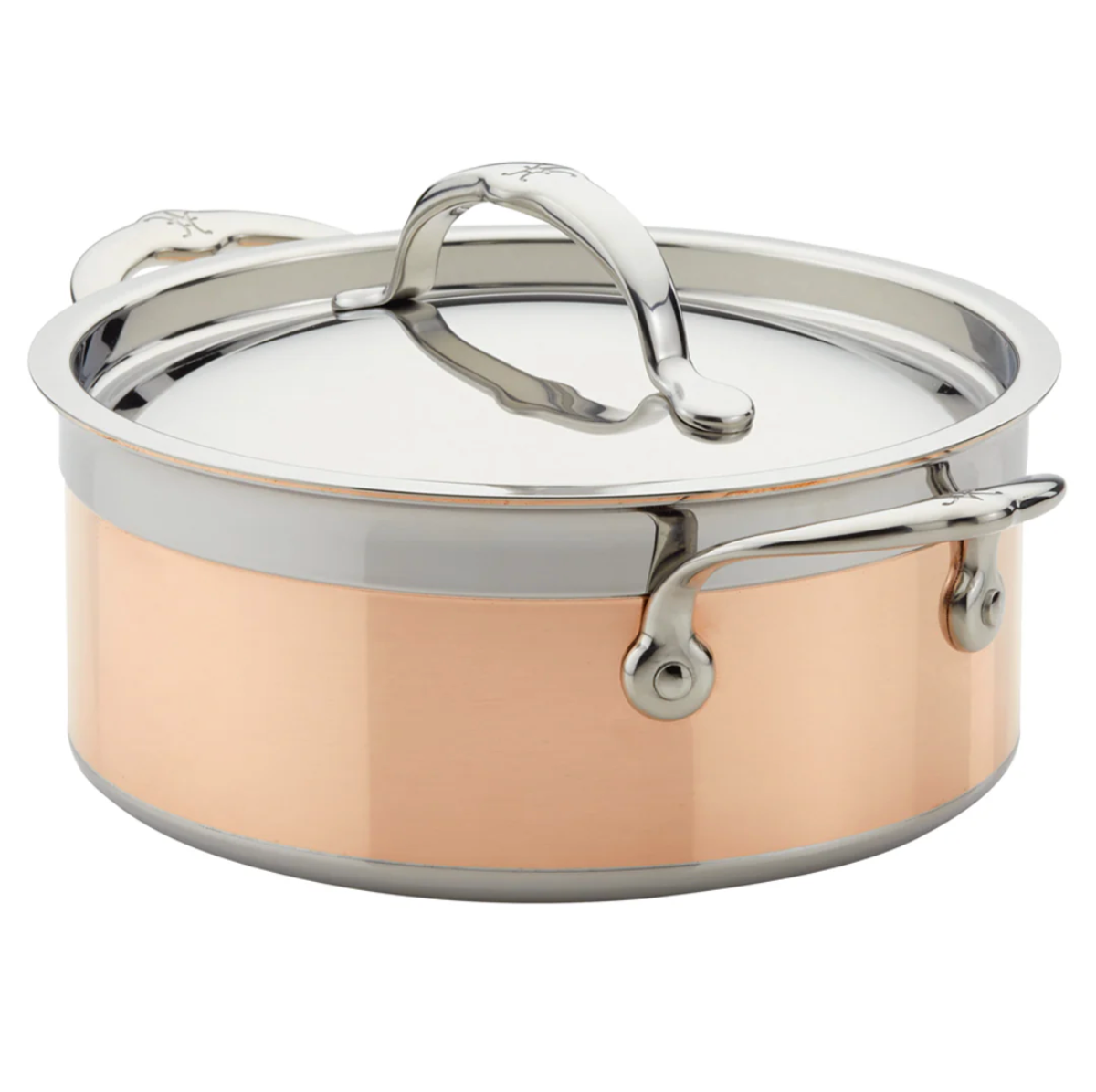 The Hestan CopperBond Copper Induction Soup Pot, 3qt, features stainless steel and copper construction, two handles, a lid, is oven safe, and sits elegantly on a white background.
