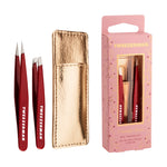 Tweezerman's Vintage Rose Gift Set features a red mini tweezer set in a gold case, displayed with its pink "Vintage Rose" packaging—essential tools for precise grooming.