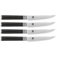 A set of four steak knives from the Shun Classic Ebony series, featuring black handles and gleaming, razor-sharp steel blades, arranged in parallel.