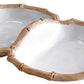 Two connected white serving bowls from the Vida Natural Bamboo Serveware Collection by Beatriz Ball feature bamboo-inspired rims. Made of luxury melamine, they are break resistant and perfect for stylish entertaining.