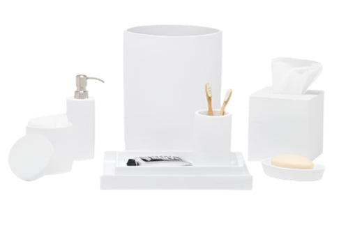 From the Dover Bath Collection by Pigeon & Poodle, this set offers white engraved resin accessories—soap dispenser, toothbrush holder, tissue box, tray, soap dish, jar, and waste bin—displayed on a white backdrop.