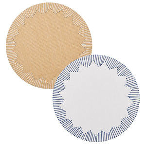 Two Kim Seybert Dream Weaver placemats, perfect for summer entertaining—one in beige with a white starburst pattern and one in white with a blue starburst pattern.