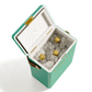 The Fieldbar Drinks Box Cooler Collection features a durable green box with an open lid, holding ice cubes and four gold-capped bottles inside for excellent thermal performance.