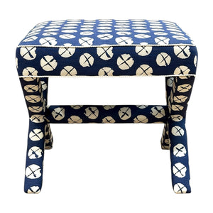 The X Ottoman by Lee Industries is a rectangular upholstered accent bench in blue custom fabric with a white circular pattern and angled legs, displayed against a white background.