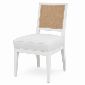 The Mariette Dining Chair by Hickory Chair is a white wooden side chair featuring a woven cane backrest and a cushioned fabric seat, displayed against a plain white background.