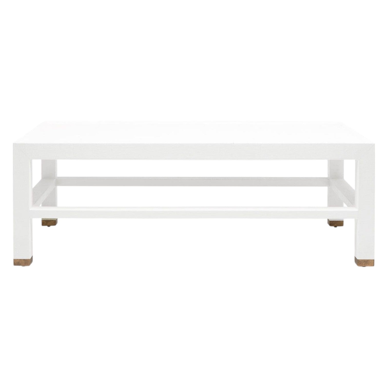 The Made Goods Jarin Coffee Table in Designer White Belgian Linen features a textured rectangular design, lower shelf, and small brown feet, displayed against a plain white background.