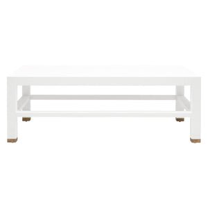 The Made Goods Jarin Coffee Table in Designer White Belgian Linen features a textured rectangular design, lower shelf, and small brown feet, displayed against a plain white background.