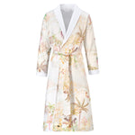 Experience luxury in the Christian Fischbacher Oasis Long Robe, featuring a tropical palm and foliage print, long sleeves, and white shawl collar and cuffs inspired by classic terry bathrobes.