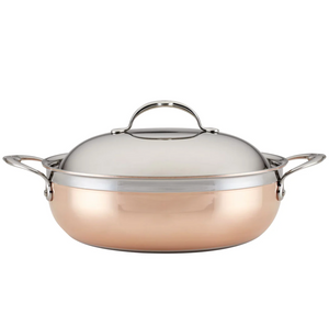 The Hestan CopperBond Copper Induction Dutch Oven, 5qt, features two side handles and a stainless steel lid, displayed against a plain white background—part of Hestan's premium cookware collection.