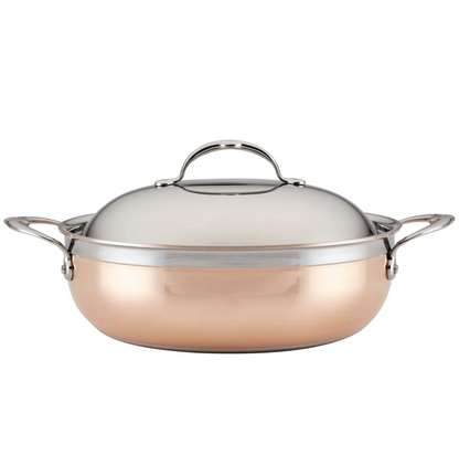 The Hestan CopperBond Copper Induction Dutch Oven, 5qt, features two side handles and a stainless steel lid, displayed against a plain white background—part of Hestan's premium cookware collection.