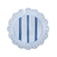 Round blue placemat with alternating light and dark blue stripes and a ruffle trim, shown on white. Pair it with your favorite Juliska Cabana Stripe Melamine Dinnerware Collection for a stylish, practical table setting.