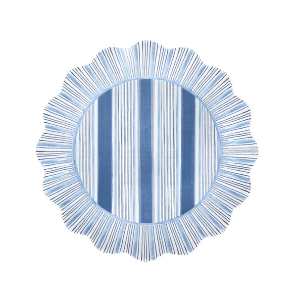 Round blue placemat with alternating light and dark blue stripes and a ruffle trim, shown on white. Pair it with your favorite Juliska Cabana Stripe Melamine Dinnerware Collection for a stylish, practical table setting.