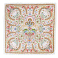 Add a touch of fantasy garden charm to your table with the Sofia Napkin Set by Juliska, featuring a square cotton napkin adorned with an intricate, symmetrical floral and scroll pattern in green, pink, brown, blue, and yellow on white.
