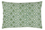 The Ankur Kidney Pillow by John Robshaw is a rectangular green pillow featuring blue and white hand-printed medallions, smiley faces, and playful patterns for a cheerful accent.