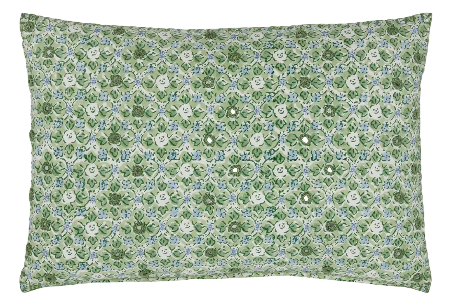 The Ankur Kidney Pillow by John Robshaw is a rectangular green pillow featuring blue and white hand-printed medallions, smiley faces, and playful patterns for a cheerful accent.