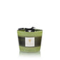 A green Baobab Collection Elementos Gaia scented candle in a glass holder with a label on the front, isolated on a white background.