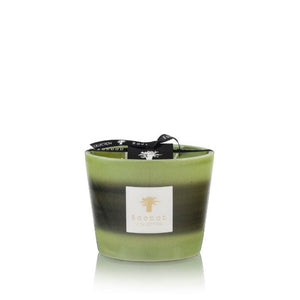 A green Baobab Collection Elementos Gaia scented candle in a glass holder with a label on the front, isolated on a white background.