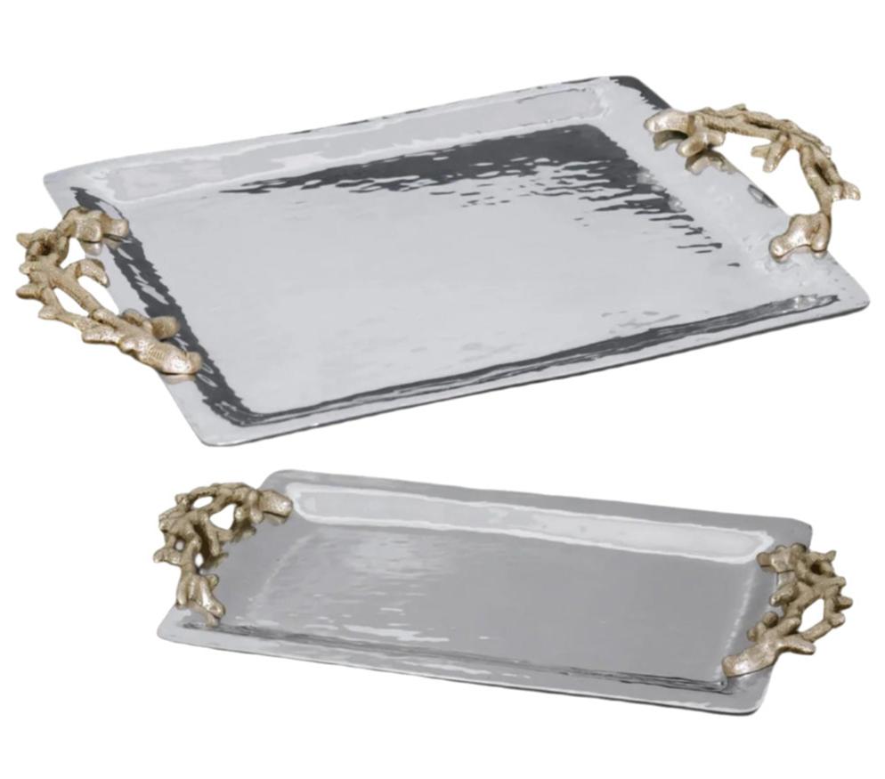 The Beatriz Ball Ocean Coral Emerson Tray Collection features two rectangular silver trays, each crafted from durable aluminum alloy with textured surfaces and decorative gold coral-shaped handles.