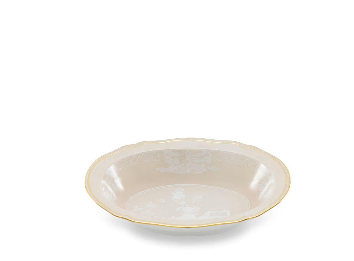 A shallow white ceramic bowl from the Ginori 1735 Oriente Italiano Meringa Dinnerware & Serveware Collection features a scalloped edge, a subtle decorative pattern inspired by Faenza ceramics, and a delicate gold rim, displayed against a plain white background.