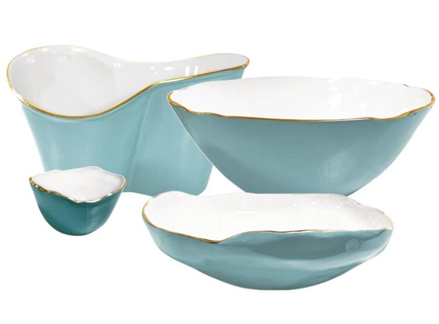 Four turquoise and white ceramic bowls with irregular edges and gold trim from the Encanto Turquoise Serveware Collection by Beatriz Ball, displayed on a white background.