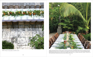 A long outdoor dining table draped in white, paired with wooden chairs and a centerpiece of tropical leaves and fruit—set on a stone patio amid lush greenery—captures the party inspiration found in “An Entertaining Story” by Common Ground.