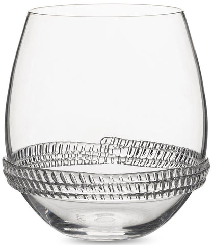 The Dean Drinkware Collection by Juliska features a clear, stemless wine glass with a decorative textured band on the lower half, crafted from mouth-blown glass.