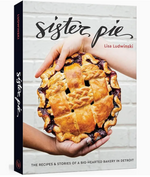 Book cover of “Sister Pie” by Penguin Random House, featuring two hands holding a decorative berry pie with a lattice crust. Subtext: Pie recipes and stories from a beloved Detroit pie shop.