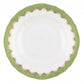 White porcelain plate with scalloped edges, a green and gold patterned rim, and a smooth center. This hand-painted Herend Fish Scale Evergreen Collection piece makes an excellent wedding or anniversary gift.