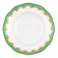 This hand-painted white decorative plate, featuring a scalloped design and a green and gold patterned border, makes an exquisite wedding or anniversary gift. Its timeless elegance is inspired by the Herend Fish Scale Evergreen Collection from Herend.