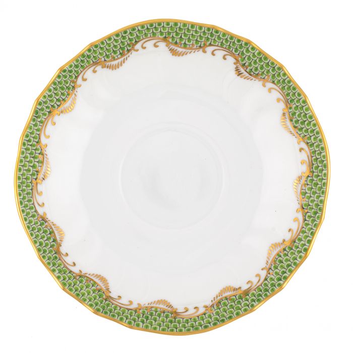 A hand-painted white porcelain plate with green and gold decorative patterns along the rim, scalloped edges, and part of the exquisite Herend Fish Scale Evergreen Collection by Herend.