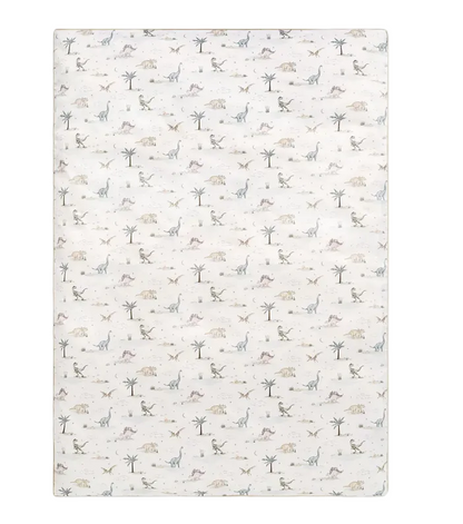 Introducing the Dino Dreams Bedding Collection from Gooselings: a rectangular white area rug featuring a repeating pattern of small, simple dinosaur illustrations, trees, and leaves in muted colors. Specially designed for baby comfort, this breathable rug is OEKO-TEX certified for your peace of mind.