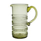 This elegant pitcher from the Ella Drinkware Collection by Juliska is expertly mouth-blown, featuring clear glass with a handle and spout and adorned with decorative spiral ribbing for timeless craftsmanship and style.