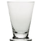 A clear glass tumbler from the Fanny Clear Collection by William Yeoward Crystal, with a thick base, is displayed against a plain white background, showcasing the collection's timeless elegance.