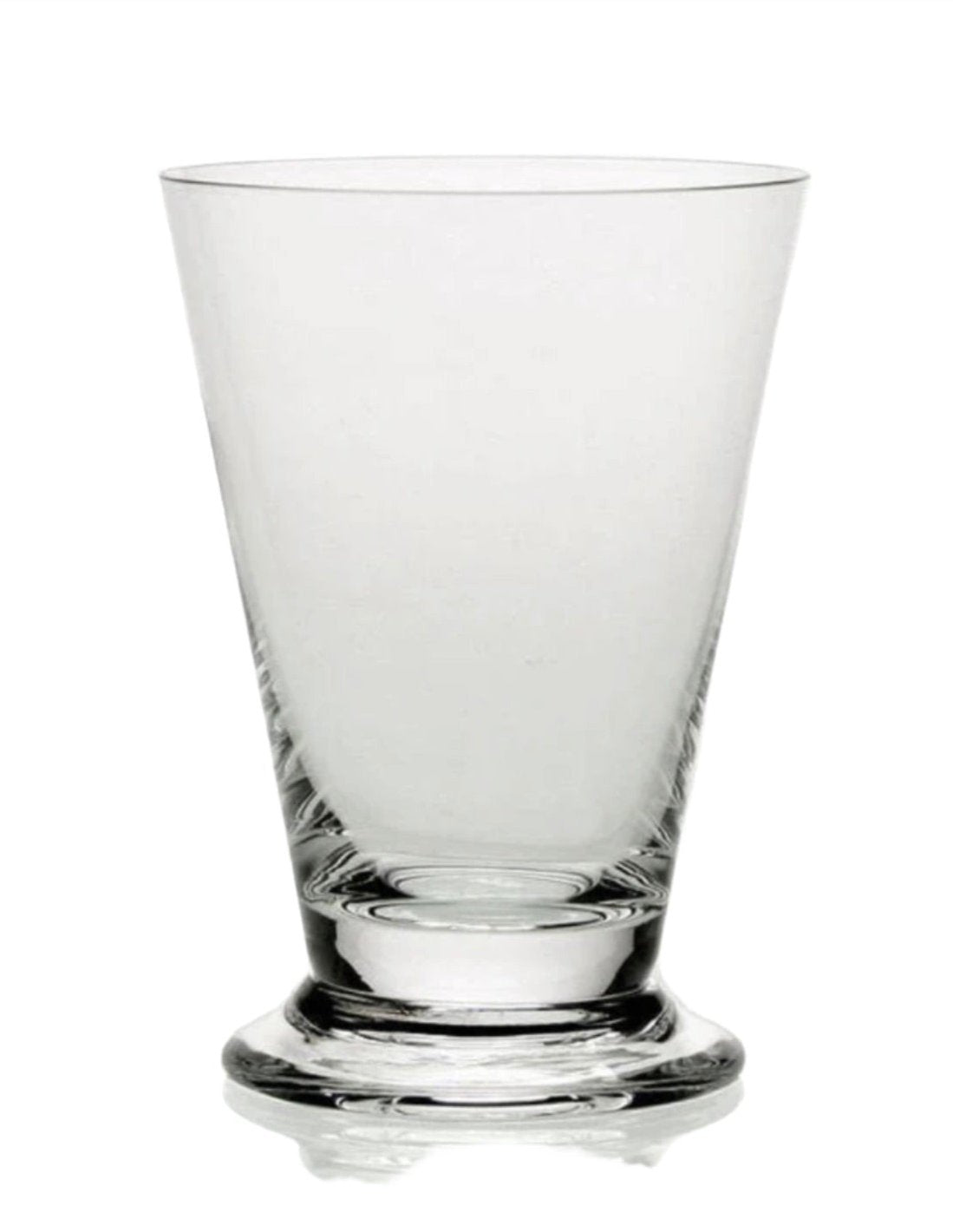 A clear glass tumbler from the Fanny Clear Collection by William Yeoward Crystal, with a thick base, is displayed against a plain white background, showcasing the collection's timeless elegance.